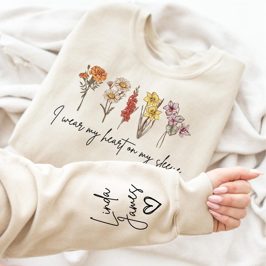 I Wear My Heart On My Sleeve Sweatshirt, Personalize Birth Month Flowers Mom Gift Sweatshirt, Christmas Gift For Mom, Mothers Day Gift