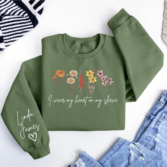 I Wear My Heart On My Sleeve Sweatshirt, Personalize Birth Month Flowers Mom Gift Sweatshirt, Christmas Gift For Mom, Mothers Day Gift