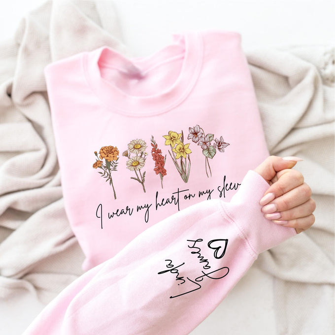I Wear My Heart On My Sleeve Sweatshirt, Personalize Birth Month Flowers Mom Gift Sweatshirt, Christmas Gift For Mom, Mothers Day Gift